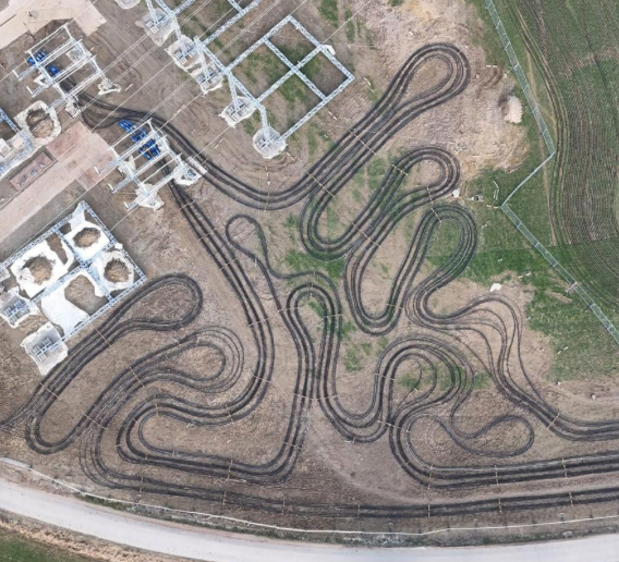 Aerial view of temporary cable connections beside a substation